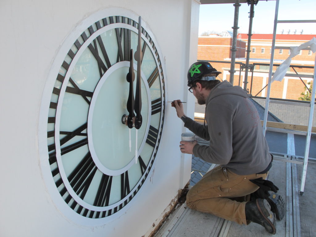 Kier Macartney doing Clock Tower clock restoration in-process by Lumichron Lancaster Hall, Longwood University