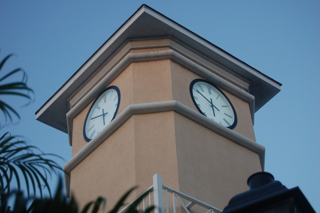 Clock tower showing two LUMICHRON clock faces 