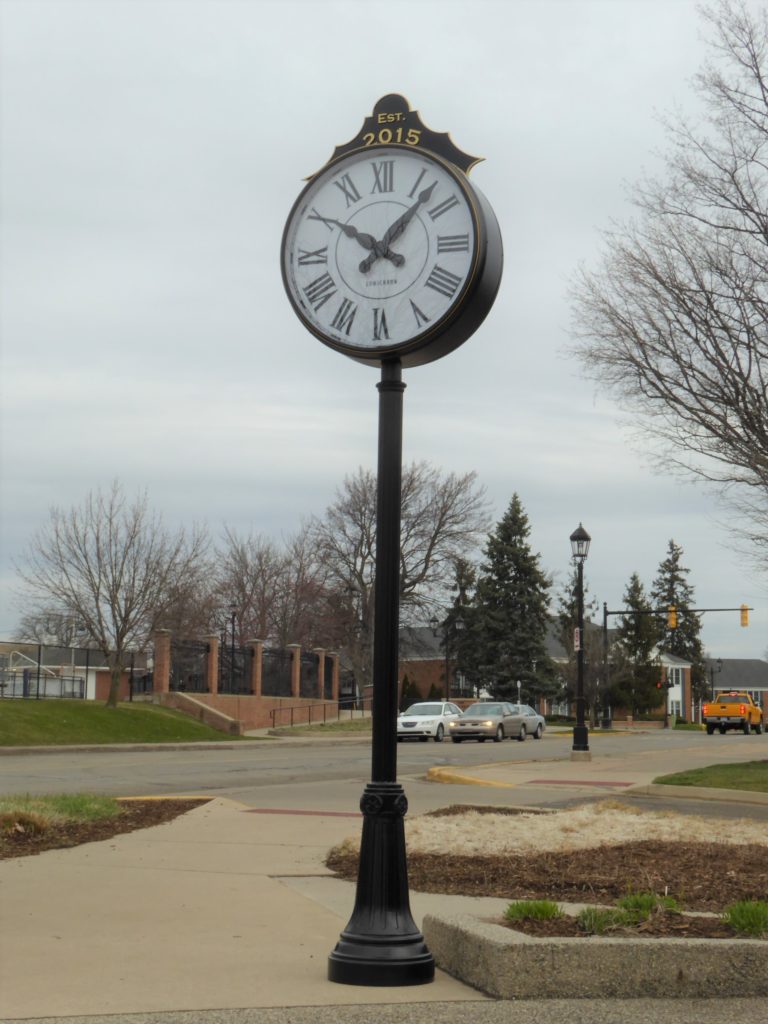 Downtown with a 36-inch Post Street Streetscape Clock illuminated fully automatic by Lumchron