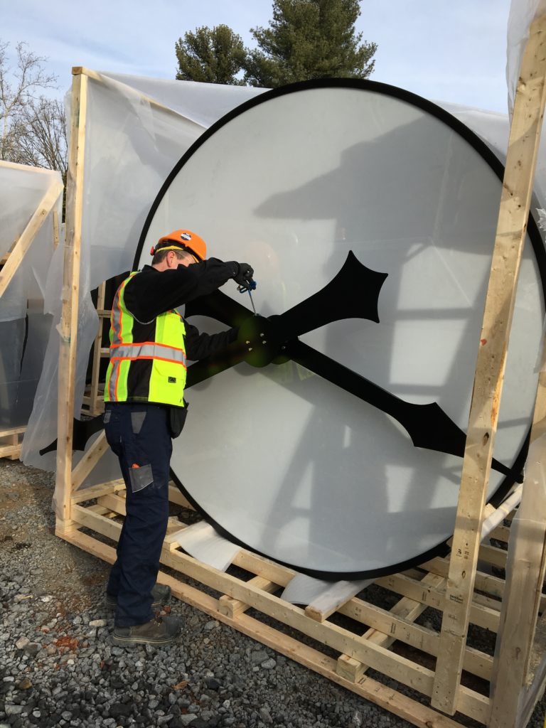 Afixing the huge hands for the Tower Clock Center section of James Madison University 156-inch clock