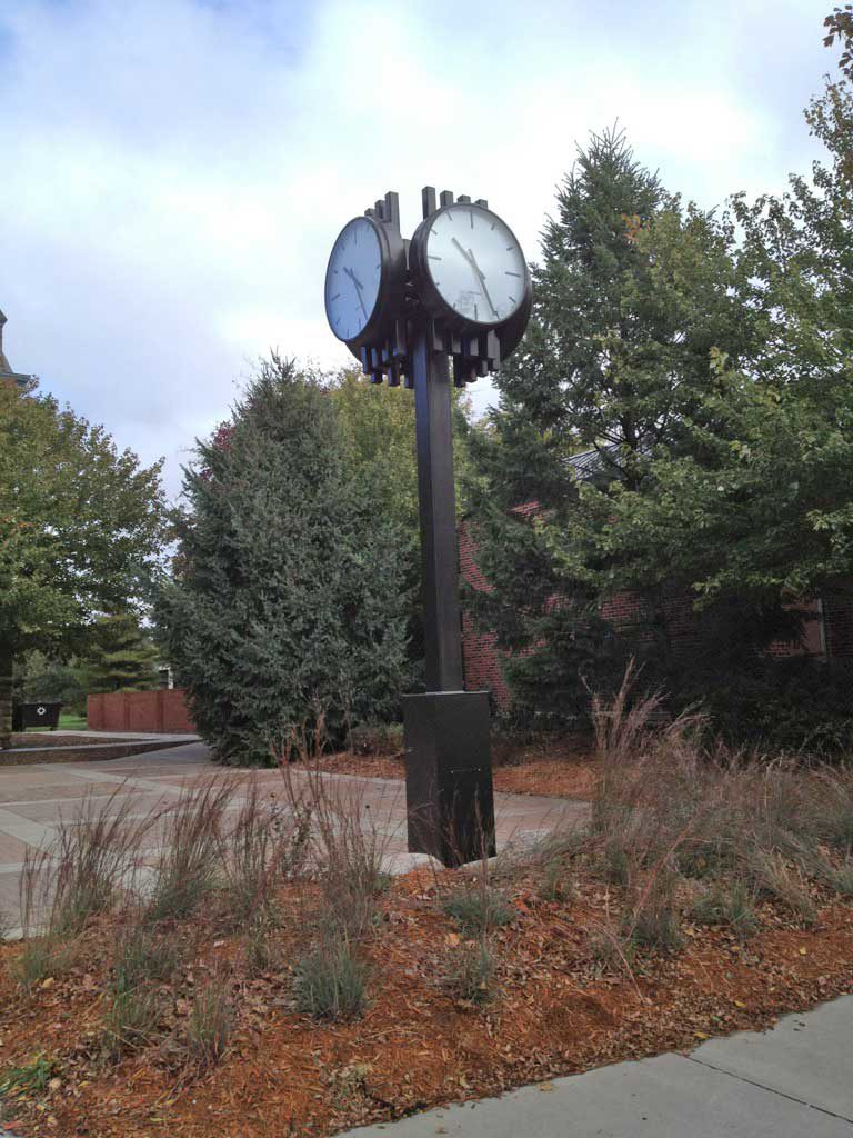 Large 4-way 36in diameter post clocks installed on Concordia University, Seward, IA by Lumichron