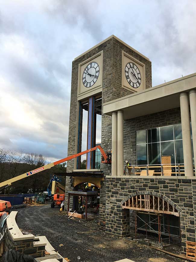 Construction work taking place on clock tower at James Madison University