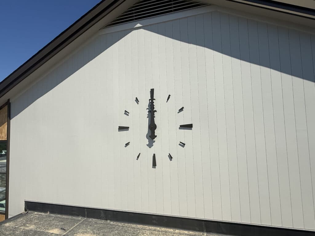 Skeletal Clock on the external wall of a building