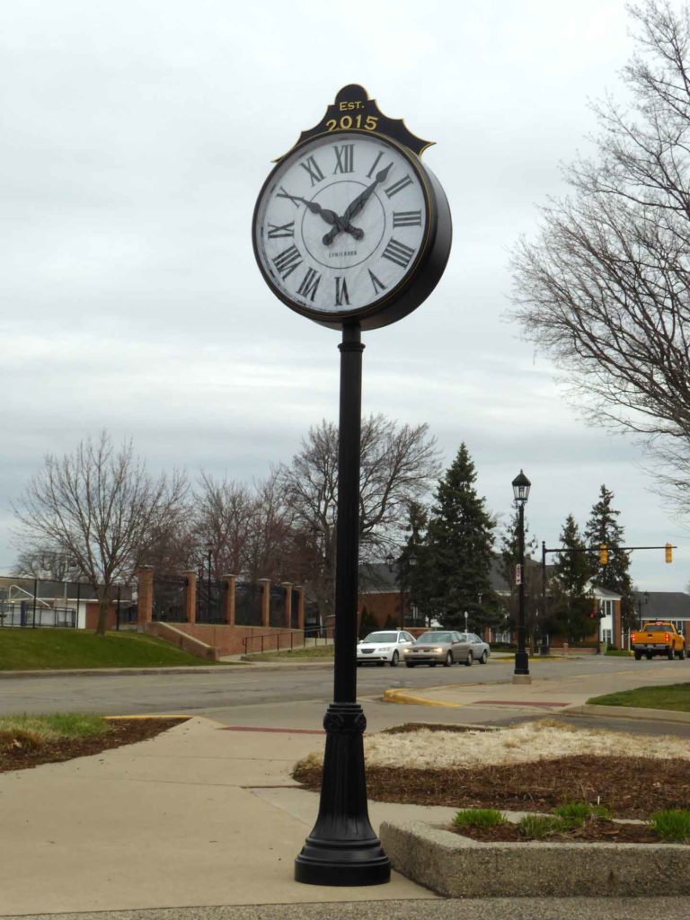 Black and gold Post Street Streetscape clock 36-inch with header panel illuminated fully automatic by Lumichron