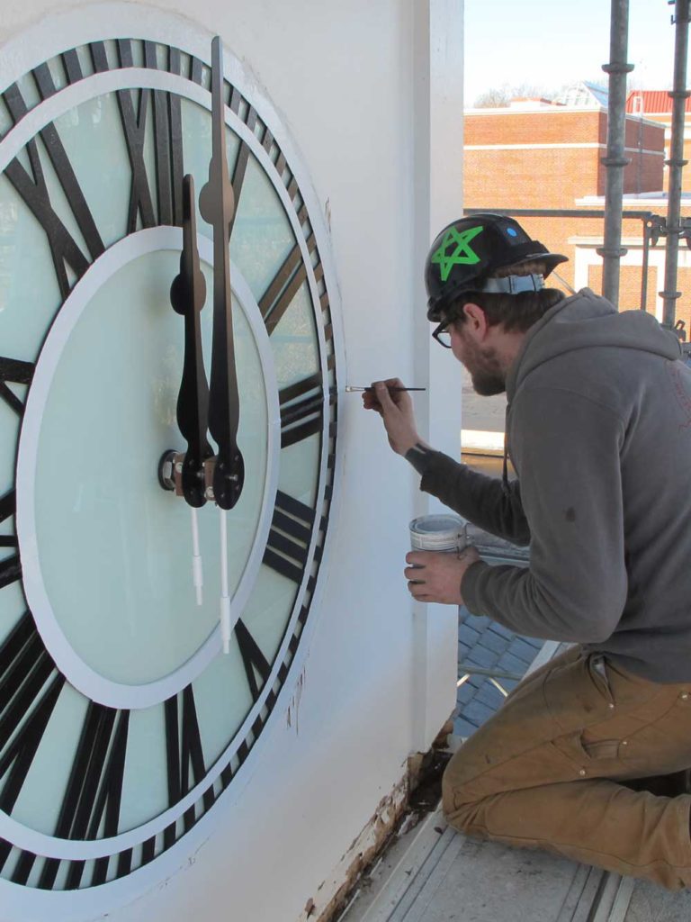 restoring details on tower clock