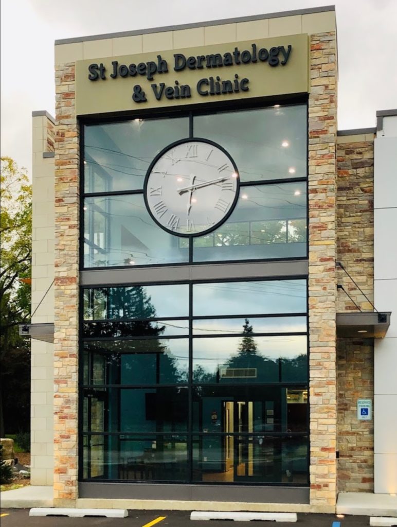 St. Joseph Dermatology Clinic on Niles Road in St. Joseph, Michigan. Beautiful New Clinic with large window clock on glass wall on the front of the building