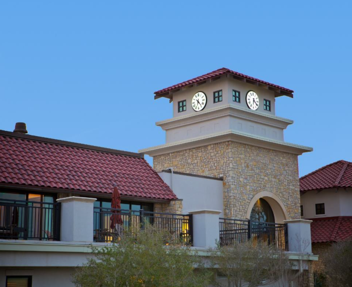 clock tower at dusk, at a country club in Dallas, with illuminated clock facesSet of 4, 60-inch diameter Lumichron Tower Clocks, Royal Oaks Country Club, Dallas, TX