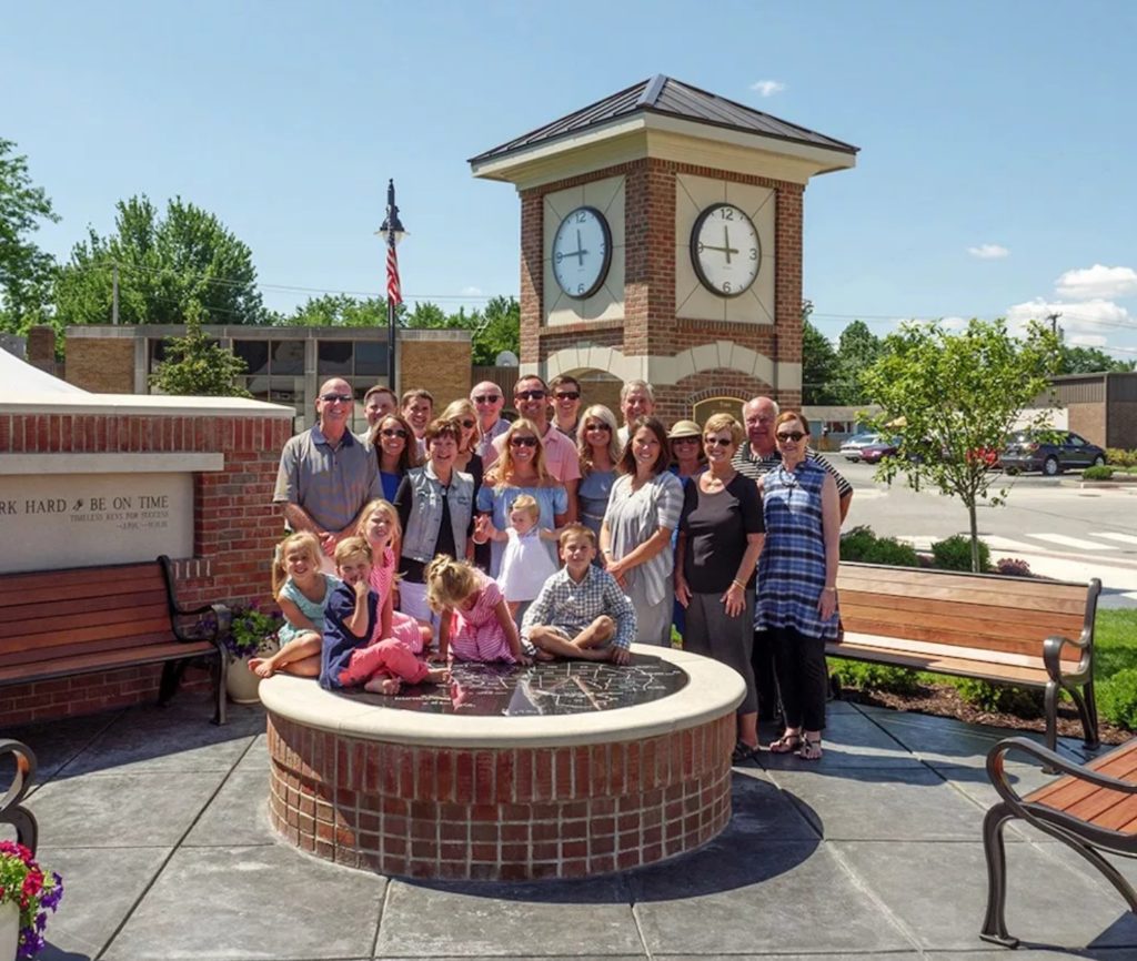 Memorial clock tower with Henney Family members photographed for dedication ceremony in Woodburn Indiana