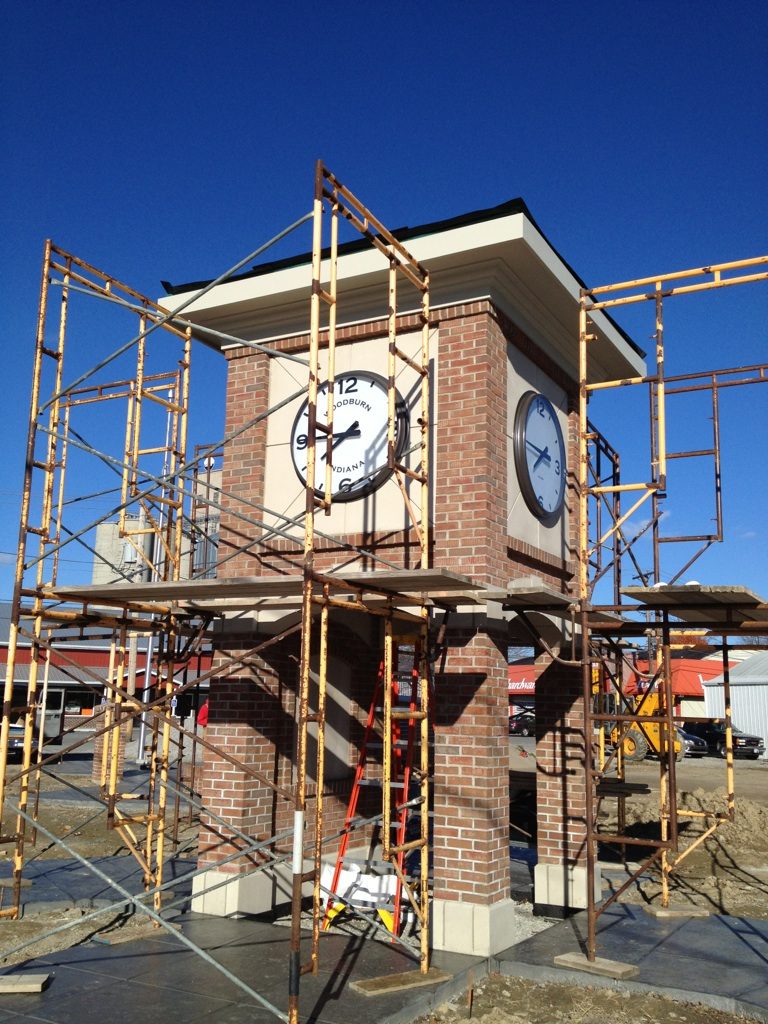 Scaffolding surrounds the brick clock tower in Woodburn Indiana, to install the set of 4, 42-inch diameter Lumichron clocks.