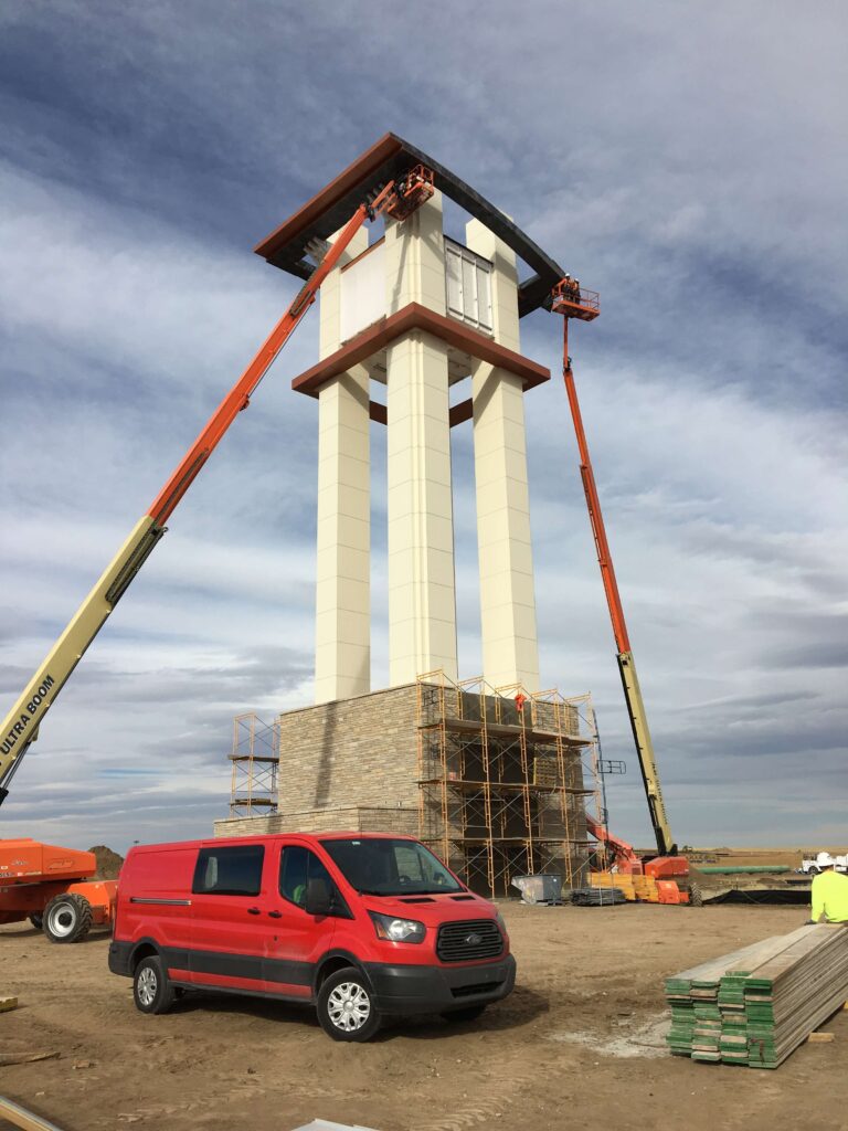 Construction of the Aurora Highlands Tower Clock, featuring four 13' tall back-lit clock faces, fully automatic heavy-duty high-torque clock motors, synchronized by GPS. 
