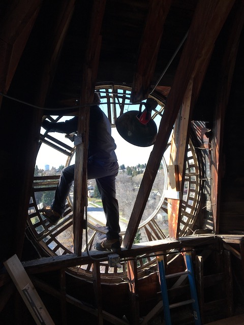 Working from inside the clock tower:  Adding all new translucent glazing and new paint on the original cast iron 8’ diameter clock dials.  
