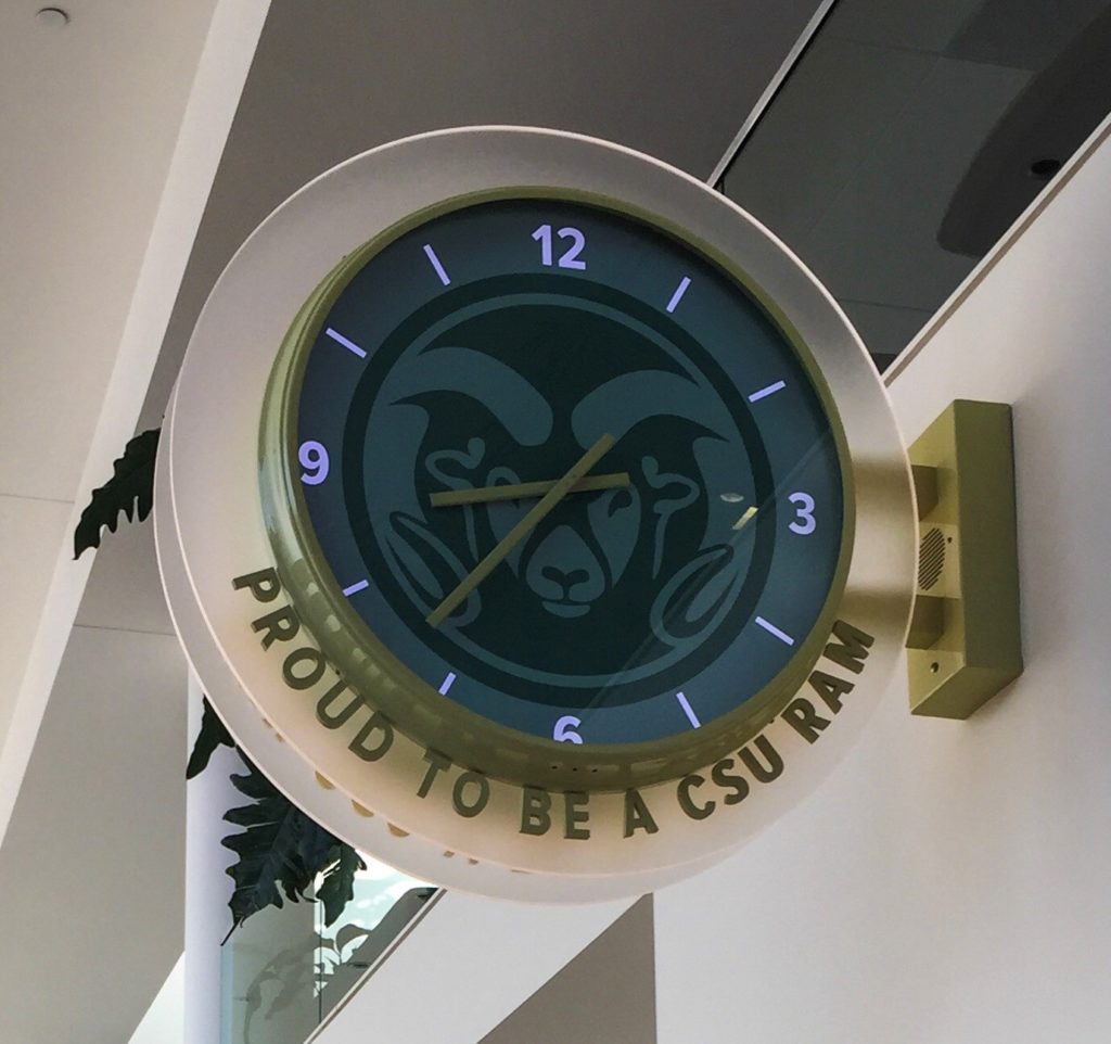 CSU Rams clock with custom background and "Proud to be a CSU Ram" text displayed on exterior