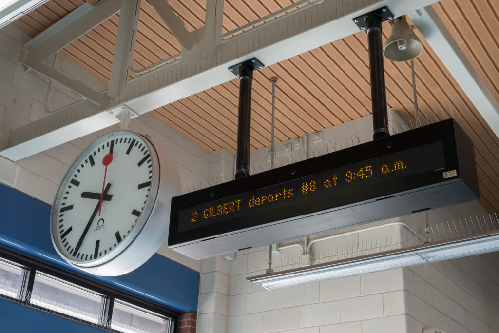 Bracket Double-faced 30-inch Mobatime Profiline Clock Suspended Transit Center by Lumichron