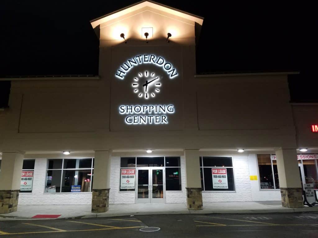 Skeletal Marker Silhouette Clock halo-lit by Lumichron, Shopping Center