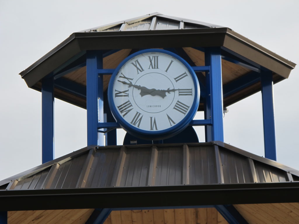 Icon Shelter park structure with a Lumichron clock, City Park, Stevensville, Michigan. clock pavilion 36-inch illuminated fully automatic