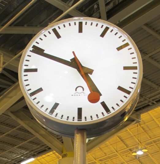 Double-faced post street Swiss railway illuminated automatic GPS clock from Lumichron